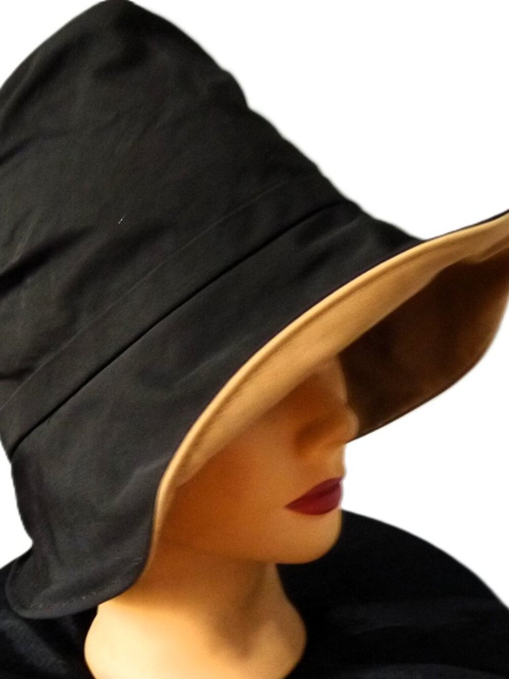 Christine A. Moore black cloche water resistant hat